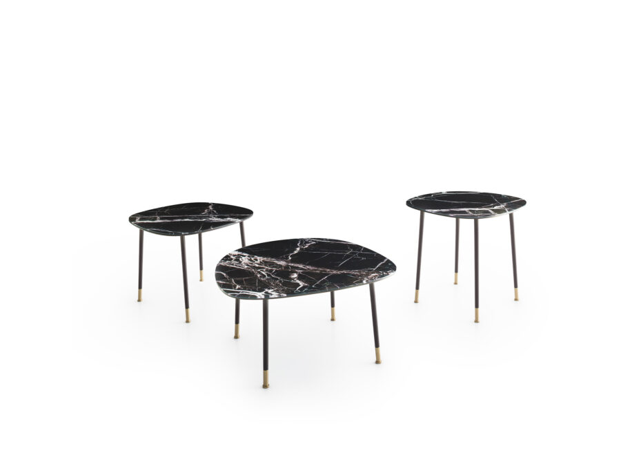 Sleek and modern coffee tables with powder-coated metal frames and brass brushed accents.