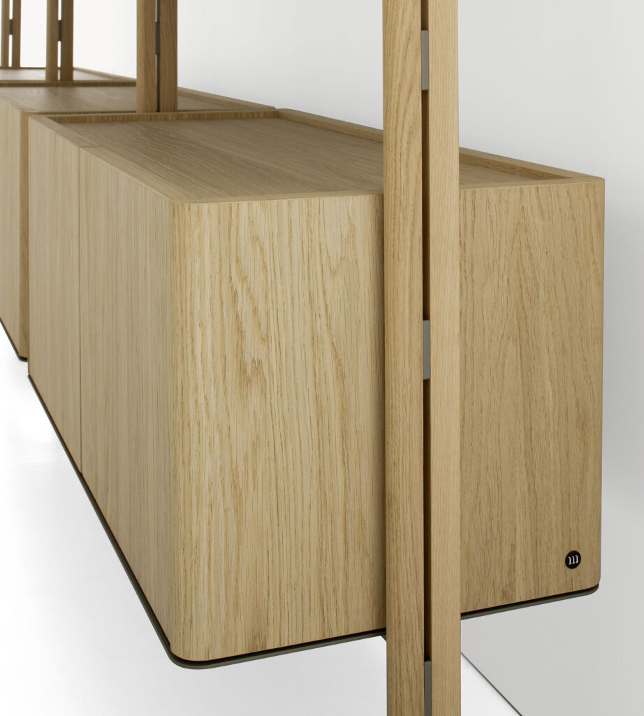 Sophisticated bookshelf modules with Natural Oak wood and Champagne metal elements.