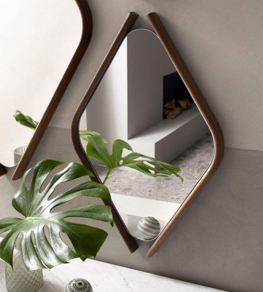 Stylish mirror-sculpture designed to elevate any living space.