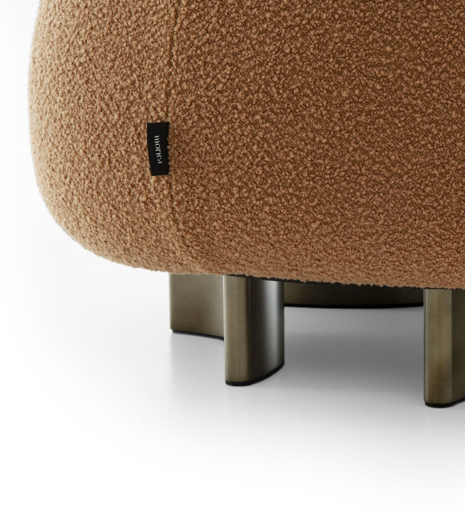 Curved MDF wood base adds a touch of elegance to this versatile pouf.